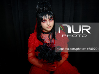 Cosplayer Manon from New York City dresses as a character from Beetlejuice for New York Comic Con at the Javits Center in New York City, on...