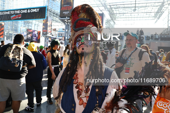 Cosplayer Captain Jack Sparrow dresses as a character from the Pirates of the Caribbean film series for New York Comic Con at the Javits Cen...