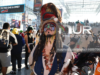 Cosplayer Captain Jack Sparrow dresses as a character from the Pirates of the Caribbean film series for New York Comic Con at the Javits Cen...