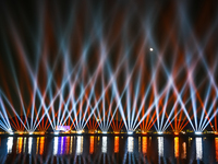 A glimpse of the sound and laser light show at Kankaria Lake reveals various vibrant colors each time it illuminates the night sky. (