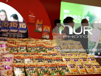 Visitors visit the exhibition hall at Shuanghui Group headquarters in Luohe, China, on October 21, 2024. (