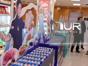 Visitors visit the exhibition hall at Shuanghui Group headquarters in Luohe, China, on October 21, 2024. (