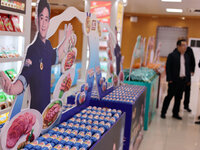 Visitors visit the exhibition hall at Shuanghui Group headquarters in Luohe, China, on October 21, 2024. (