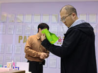 Visitors visit the Zhongyuan Food Laboratory at Luohe Vocational University of Food Engineering in Luohe, China, on October 21, 2024. (