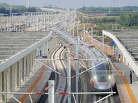 The first train of the Weifang-Yantai High-Speed Railway enters Laizhou Station in Shandong province in Yantai, China, on October 21, 2024....