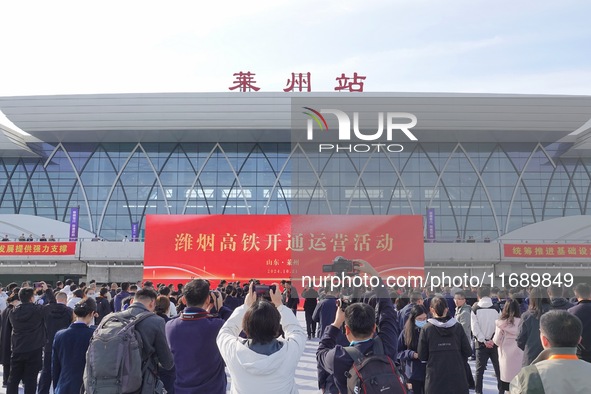 A ceremony to open the Weifang-Yantai High-speed Railway takes place at Laizhou Station in Shandong province in Yantai, China, on October 21...