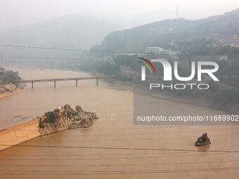 A photo taken on October 21, 2024, shows the Sanmenxia Dam in Sanmenxia, China. (