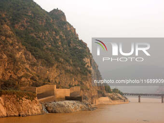 A photo taken on October 21, 2024, shows the Sanmenxia Dam in Sanmenxia, China. (