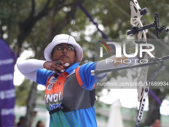 Deepika Kumari of India competes against Alejandra Valencia of Mexico (not in picture) during the women's recurve Semifinals match on the fi...