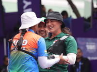 Deepika Kumari of India and Alejandra Valencia of Mexico compete during the women's recurve semifinals match on the final day of the Tlaxcal...