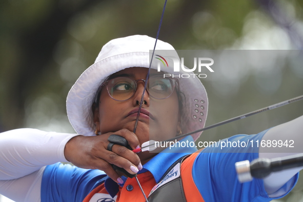 Deepika Kumari of India competes against Alejandra Valencia of Mexico (not in picture) during the women's recurve Semifinals match on the fi...