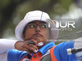 Deepika Kumari of India competes against Alejandra Valencia of Mexico (not in picture) during the women's recurve Semifinals match on the fi...