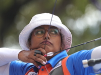 Deepika Kumari of India competes against Alejandra Valencia of Mexico (not in picture) during the women's recurve Semifinals match on the fi...