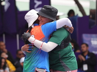 Deepika Kumari of India and Alejandra Valencia of Mexico compete during the women's recurve semifinals match on the final day of the Tlaxcal...