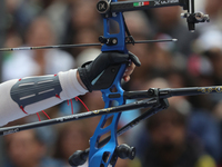 Alejandra Valencia of Mexico competes against Deepika Kumari of India (not in picture) during the women's recurve semifinals match on the fi...