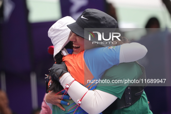 Deepika Kumari of India and Alejandra Valencia of Mexico compete during the women's recurve semifinals match on the final day of the Tlaxcal...