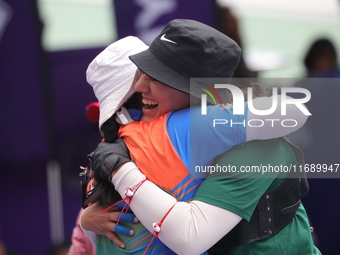 Deepika Kumari of India and Alejandra Valencia of Mexico compete during the women's recurve semifinals match on the final day of the Tlaxcal...