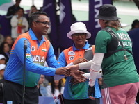 Deepika Kumari of India and Alejandra Valencia of Mexico compete during the women's recurve semifinals match on the final day of the Tlaxcal...