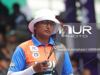 Deepika Kumari of India competes against Alejandra Valencia of Mexico (not in picture) during the women's recurve Semifinals match on the fi...