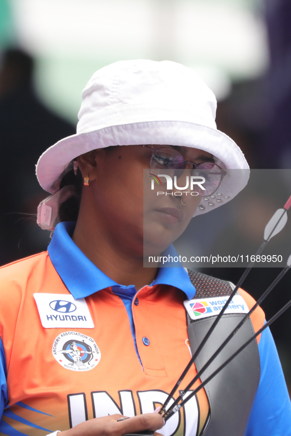 Deepika Kumari of India competes against Alejandra Valencia of Mexico (not in picture) during the women's recurve Semifinals match on the fi...