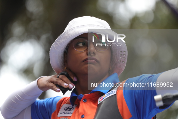 Deepika Kumari of India competes against Alejandra Valencia of Mexico (not in picture) during the women's recurve Semifinals match on the fi...