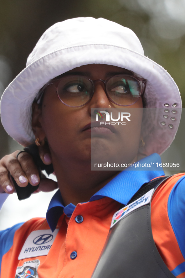 Deepika Kumari of India competes against Alejandra Valencia of Mexico (not in picture) during the women's recurve Semifinals match on the fi...