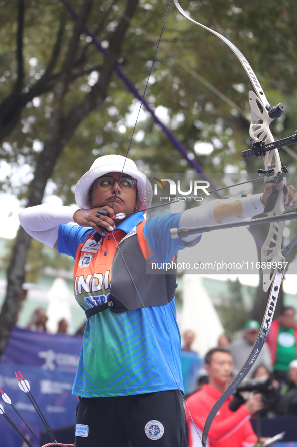 Deepika Kumari of India competes against Alejandra Valencia of Mexico (not in picture) during the women's recurve Semifinals match on the fi...