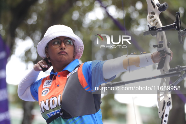 Deepika Kumari of India competes against Alejandra Valencia of Mexico (not in picture) during the women's recurve Semifinals match on the fi...