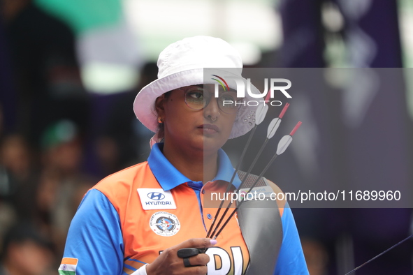 Deepika Kumari of India competes against Alejandra Valencia of Mexico (not in picture) during the women's recurve Semifinals match on the fi...