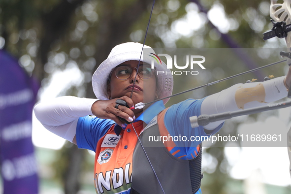 Deepika Kumari of India competes against Alejandra Valencia of Mexico (not in picture) during the women's recurve Semifinals match on the fi...