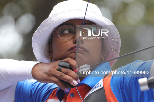 Deepika Kumari of India competes against Alejandra Valencia of Mexico (not in picture) during the women's recurve Semifinals match on the fi...