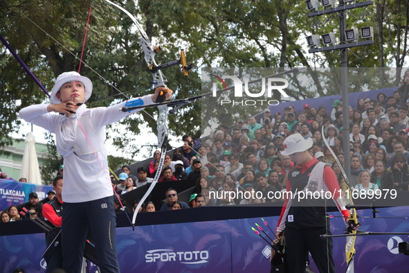 Li Jiaman of China and Jeon Hunyoung of Korea compete during the women's recurve semifinals match on the final day of the Tlaxcala 2024 Arch...