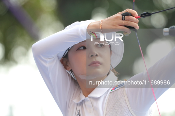 Jeon Hunyoung of Korea competes against Alejandra Valencia of Mexico (not in picture) during the women's recurve 3rd place match on the fina...