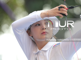 Jeon Hunyoung of Korea competes against Alejandra Valencia of Mexico (not in picture) during the women's recurve 3rd place match on the fina...