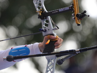 Jeon Hunyoung of Korea competes against Alejandra Valencia of Mexico (not in picture) during the women's recurve 3rd place match on the fina...