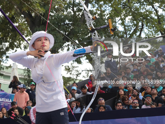 Jeon Hunyoung of Korea competes against Alejandra Valencia of Mexico (not in picture) during the women's recurve 3rd place match on the fina...