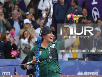 Alejandra Valencia of Mexico competes against Jeon Hunyoung of Korea (not in picture) during the women's recurve 3rd place match on the fina...