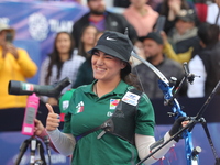 Alejandra Valencia of Mexico competes against Jeon Hunyoung of Korea (not in picture) during the women's recurve 3rd place match on the fina...