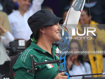 Alejandra Valencia of Mexico competes against Jeon Hunyoung of Korea (not in picture) during the women's recurve 3rd place match on the fina...