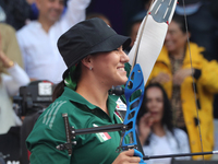 Alejandra Valencia of Mexico competes against Jeon Hunyoung of Korea (not in picture) during the women's recurve 3rd place match on the fina...