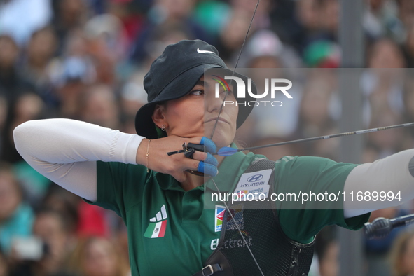 Alejandra Valencia of Mexico competes against Jeon Hunyoung of Korea (not in picture) during the women's recurve 3rd place match on the fina...