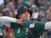 Alejandra Valencia of Mexico competes against Jeon Hunyoung of Korea (not in picture) during the women's recurve 3rd place match on the fina...