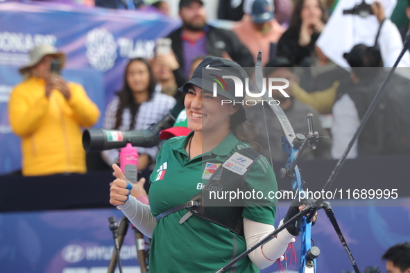 Alejandra Valencia of Mexico competes against Jeon Hunyoung of Korea (not in picture) during the women's recurve 3rd place match on the fina...