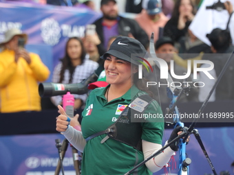 Alejandra Valencia of Mexico competes against Jeon Hunyoung of Korea (not in picture) during the women's recurve 3rd place match on the fina...