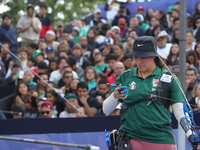 Alejandra Valencia of Mexico competes against Jeon Hunyoung of Korea (not in picture) during the women's recurve 3rd place match on the fina...