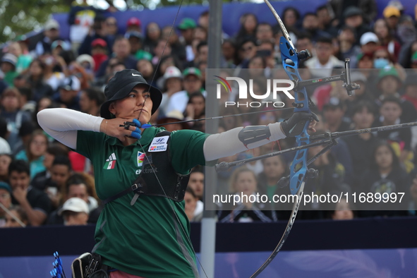 Alejandra Valencia of Mexico competes against Jeon Hunyoung of Korea (not in picture) during the women's recurve 3rd place match on the fina...