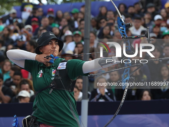 Alejandra Valencia of Mexico competes against Jeon Hunyoung of Korea (not in picture) during the women's recurve 3rd place match on the fina...