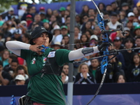 Alejandra Valencia of Mexico competes against Jeon Hunyoung of Korea (not in picture) during the women's recurve 3rd place match on the fina...