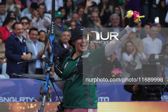 Alejandra Valencia of Mexico competes against Jeon Hunyoung of Korea (not in picture) during the women's recurve 3rd place match on the fina...