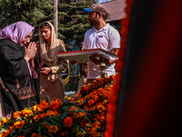 Family members of police martyrs pay tribute to the soldiers who sacrifice their lives in service during Police Commemoration Day in Baramul...